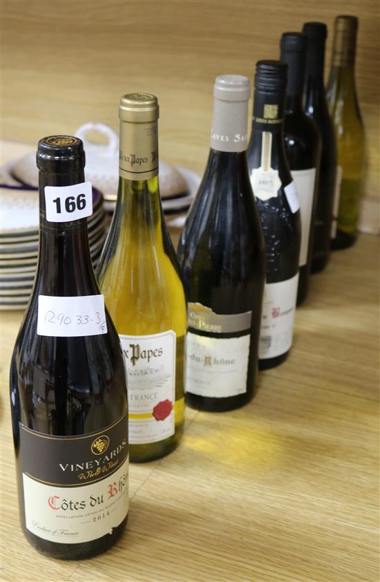 Seven assorted red and white wines including one Chartreuse de Bonpas Reserve and three Cotes du Rhone wines.